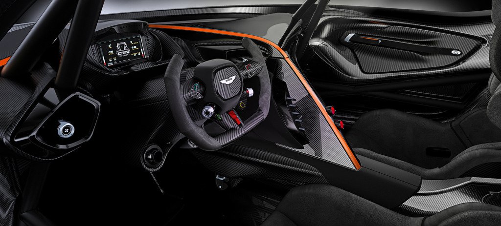 Alcantara & leather contrast with aluminum, titanium and carbon fiber details inside the driver focused interior